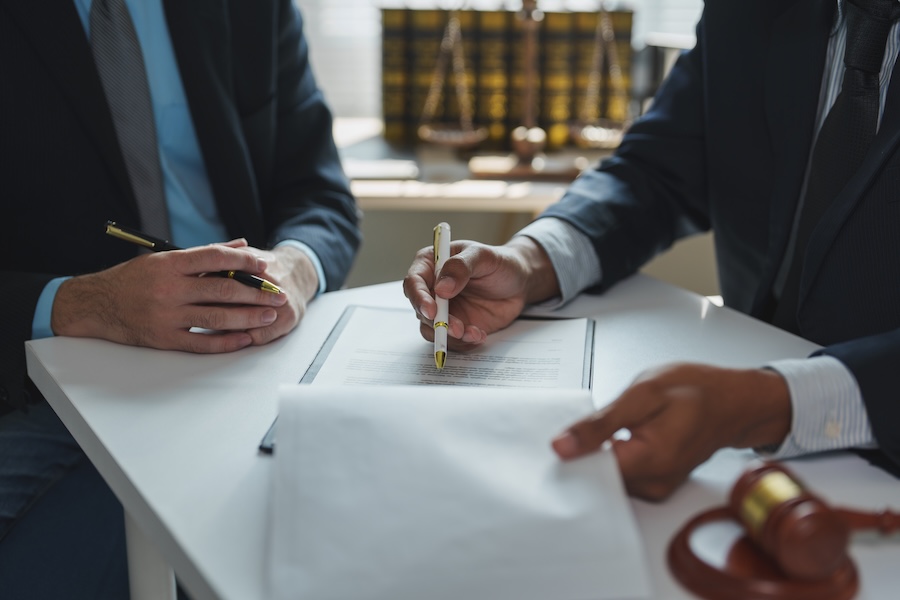 lawyers reviewing and discussing contract details 2026 01 08 08 09 43 utc